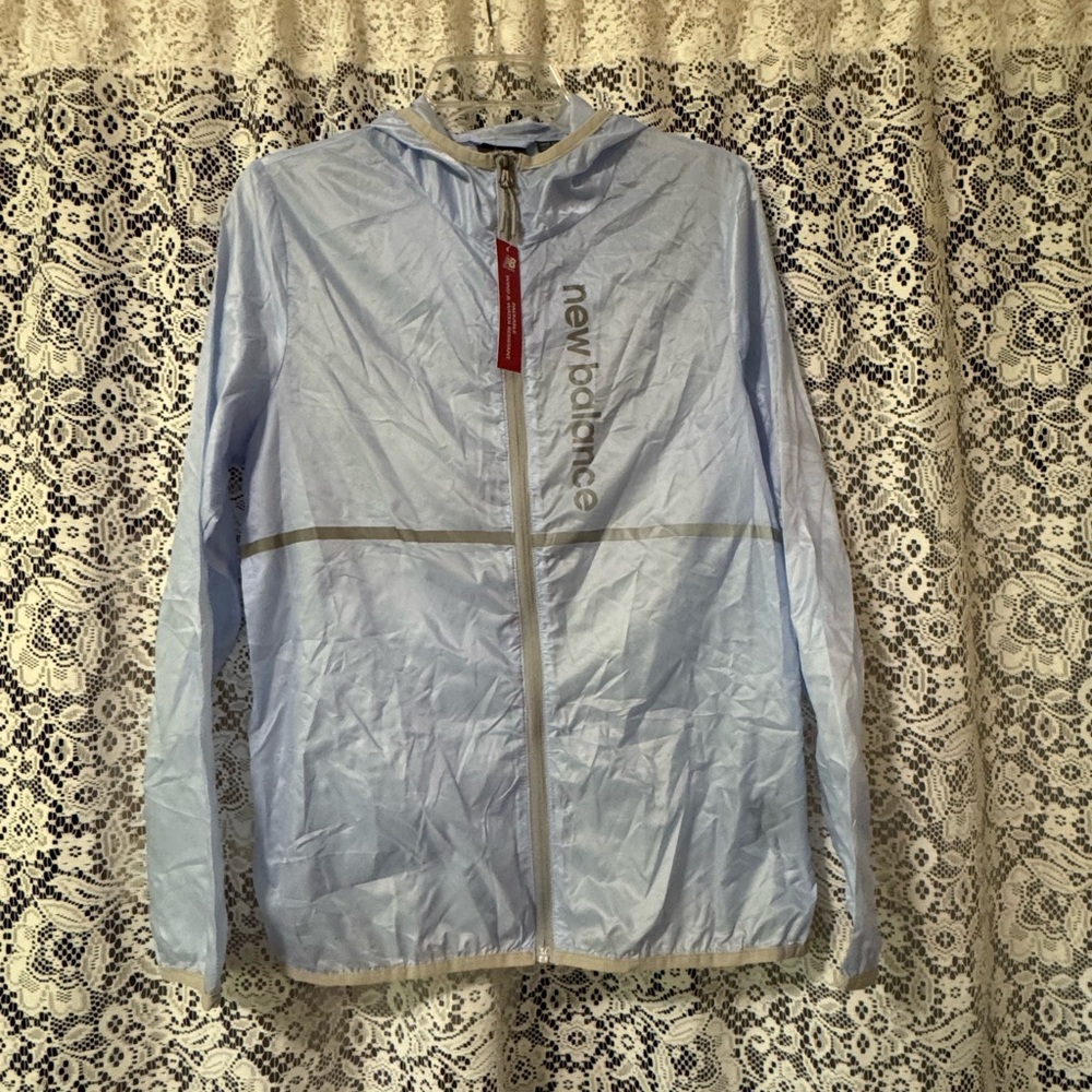 New balance wind breaker. Brand new, size M, tags still on